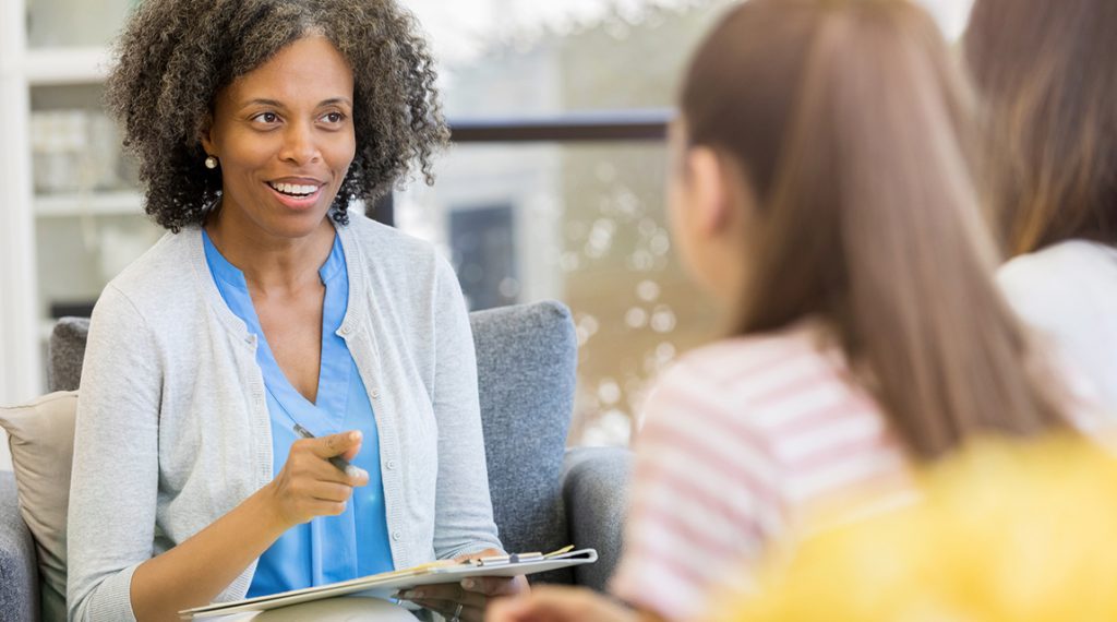 Therapist speaks with teen girls about picky eating and disordered eating behaviors