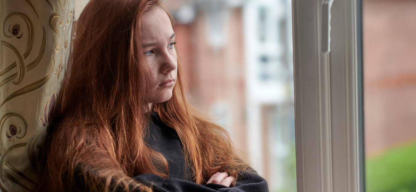 Sad Red-headed teen girl